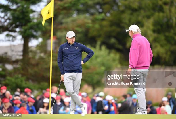 Matthew Fitzpatrick of England chats with Irish Businessman Dermott Desmond at the 10th hole during Day One of the JP McManus Pro-Am at Adare Manor...