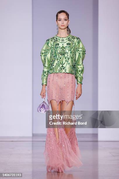 Model walks the runway during the Georges Hobeika Haute Couture Fall Winter 2022 2023 show as part of Paris Fashion Week on July 04, 2022 in Paris,...