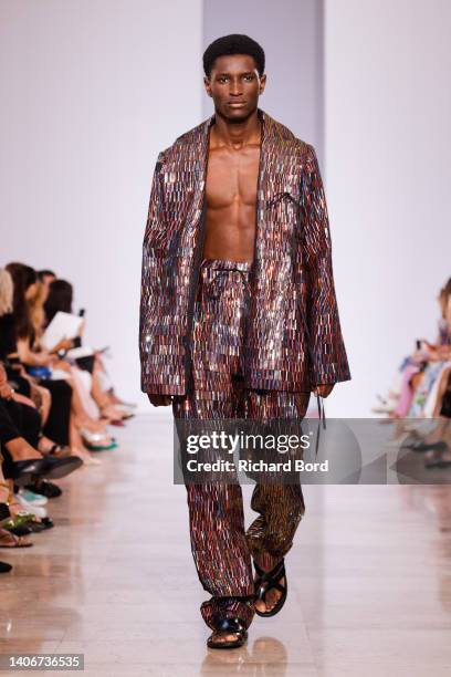 Model walks the runway during the Georges Hobeika Haute Couture Fall Winter 2022 2023 show as part of Paris Fashion Week on July 04, 2022 in Paris,...