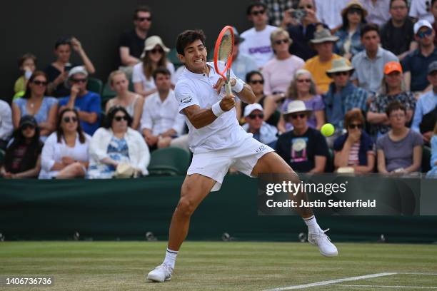 Cristian Garin of Chile plays a forehand against Alex de Minaur of Australia during their Men's Singles Fourth Round match on day eight of The...