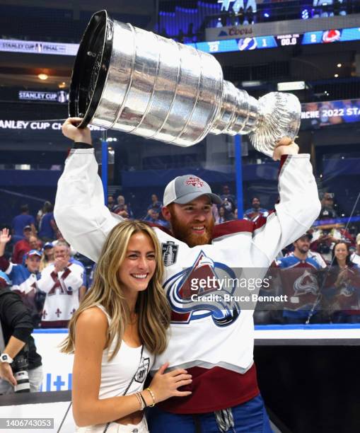 Compher of the Colorado Avalanche holds the Stanley Cup following their victory over the Tampa Bay Lightning in Game Six of the 2022 NHL Stanley Cup...