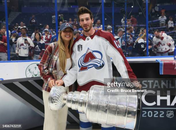 Jayson Megna of the Colorado Avalanche holds the Stanley Cup following their victory over the Tampa Bay Lightning in Game Six of the 2022 NHL Stanley...