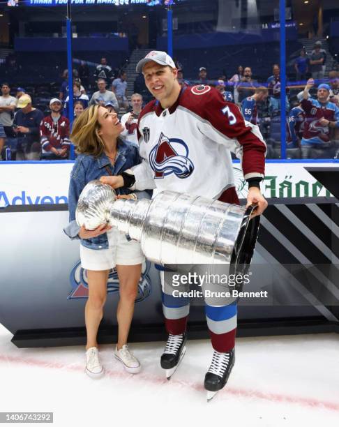 Jack Johnson of the Colorado Avalanche holds the Stanley Cup following their victory over the Tampa Bay Lightning in Game Six of the 2022 NHL Stanley...
