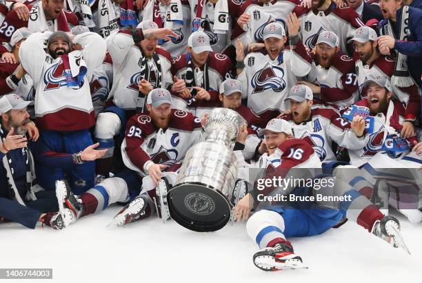The Colorado Avalanche ding the Stanley Cup after their victory over the Tampa Bay Lightning in Game Six of the 2022 NHL Stanley Cup Final at Amalie...