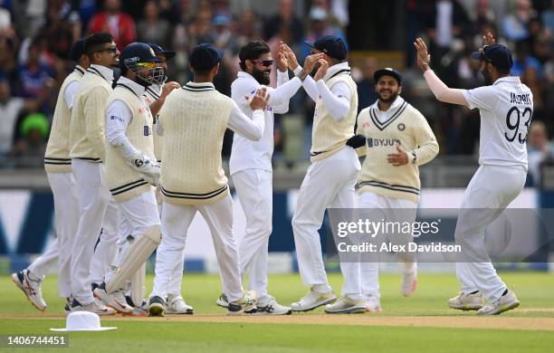 Ravindra Jadeja of India celebrates running out Alex Lees with teammates during Day Four of the Fifth Lv=Insurance Test Match at Edgbaston on July...