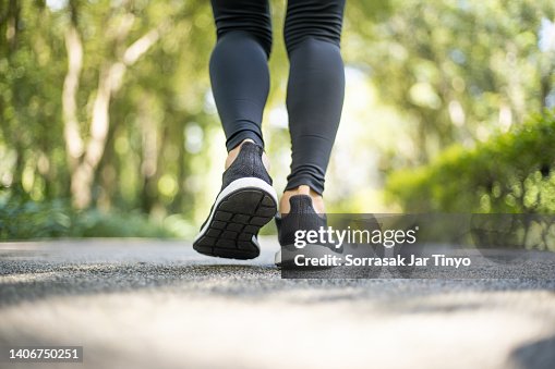 Close up of young athlete women feet in running activity Close up of young athlete women feet in running activity