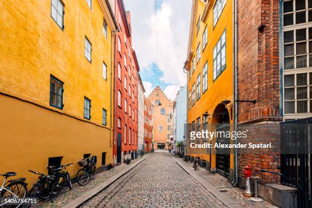 magaestrade colorful street in copenhagen old town, denmark - zealand denmark stock pictures, royalty-free photos & images