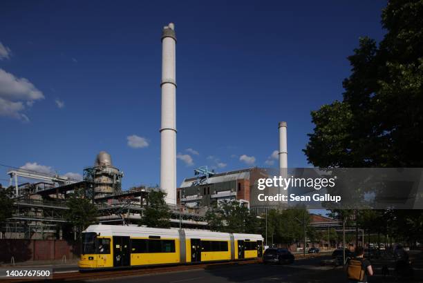 City tram passes by the Klingenberg natural gas-powered thermal power station on July 04, 2022 in Berlin, Germany. Germany still receives a large...