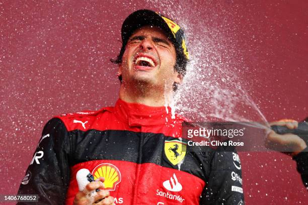 Race winner Carlos Sainz of Spain and Ferrari celebrates on the podium after the F1 Grand Prix of Great Britain at Silverstone on July 03, 2022 in...