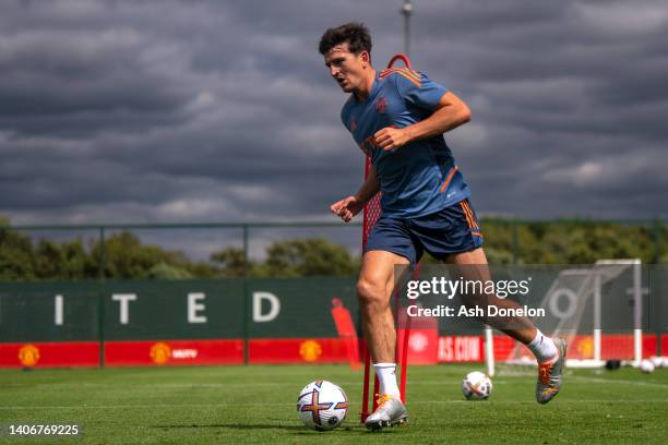 Harry Maguire of Manchester United in action during a first team training session at Carrington Training Ground on July 04, 2022 in Manchester,...