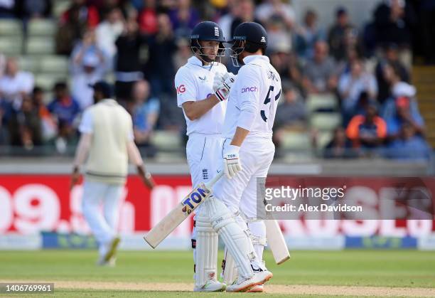 Joe Root and Jonny Bairstow of England interact during Day Four of the Fifth Lv=Insurance Test Match at Edgbaston on July 04, 2022 in Birmingham,...