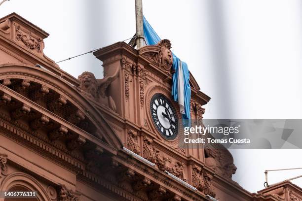 An Argentine flag is seen at government house "Casa Rosada" on July 04, 2022 in Buenos Aires, Argentina. In the midst of a political crisis and...