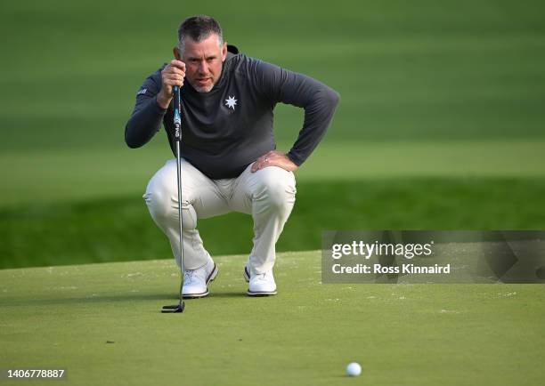 Lee Westwood of England looks over his putt as he finishes his round during Day One of the JP McManus Pro-Am at Adare Manor on July 04, 2022 in...