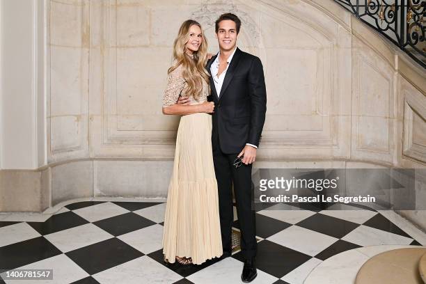 Elle Macpherson and Arpad Flynn Alexander Busson attend the Christian Dior Haute Couture Fall Winter 2022 2023 show as part of Paris Fashion Week on...