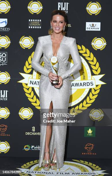 Kate Beckinsale with the award for Best Actress for "Jolt" during the National Film Awards 2022 at Porchester Hall on July 04, 2022 in London,...