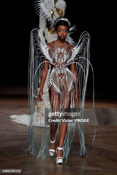 Model walks the runway during the Iris Van Herpen Haute Couture Fall/Winter 2022-2023 fashion show as part of the Paris Haute Couture Week on July 4,...