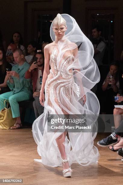 Model walks the runway during the Iris Van Herpen Haute Couture Fall Winter 2022 2023 show as part of Paris Fashion Week on July 04, 2022 in Paris,...