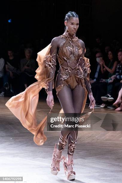 Model Cindy Bruna walks the runway during the Iris Van Herpen Haute Couture Fall Winter 2022 2023 show as part of Paris Fashion Week on July 04, 2022...