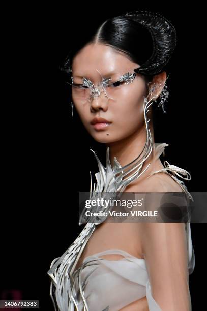 Model walks the runway during the Iris Van Herpen Haute Couture Fall/Winter 2022-2023 fashion show as part of the Paris Haute Couture Week on July 4,...