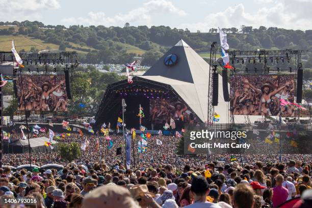 Crowds of people gather in front of the main Pyramid Stage to watch Diana Ross perform at the 2022 Glastonbury Festival during day two of Glastonbury...