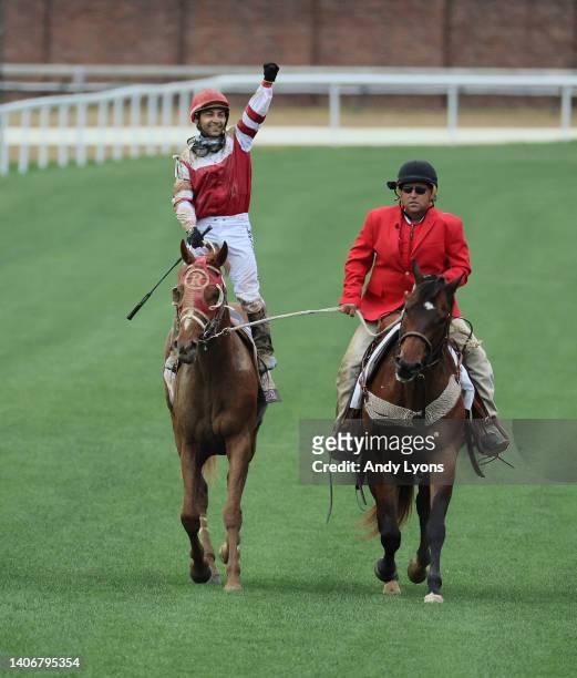 Jockey Sonny Leon aboard Rich Strike celebrates after Rich Strike won the 148th running at Churchill Downs on May 07, 2022 in Louisville, Kentucky.