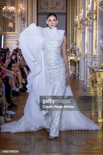 Model walks the runway during the Tony Ward Haute Couture Fall Winter 2022 2023 show as part of Paris Fashion Week At Shangri La on July 04, 2022 in...