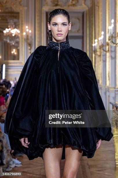 Model walks the runway during the Tony Ward Haute Couture Fall Winter 2022 2023 show as part of Paris Fashion Week At Shangri La on July 04, 2022 in...