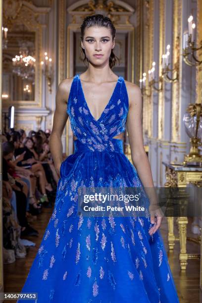 Model walks the runway during the Tony Ward Haute Couture Fall Winter 2022 2023 show as part of Paris Fashion Week At Shangri La on July 04, 2022 in...