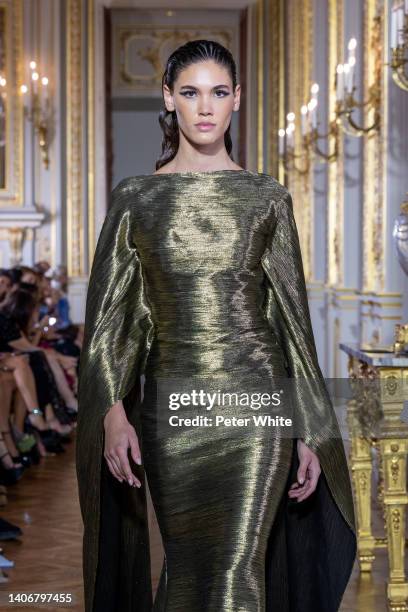 Model walks the runway during the Tony Ward Haute Couture Fall Winter 2022 2023 show as part of Paris Fashion Week At Shangri La on July 04, 2022 in...