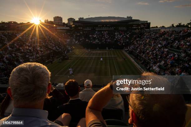 Jack Sock of The United States and partner Coco Gauff of The United States play against Edouard Roger-Vasselin of France and Alize Cornet of France...