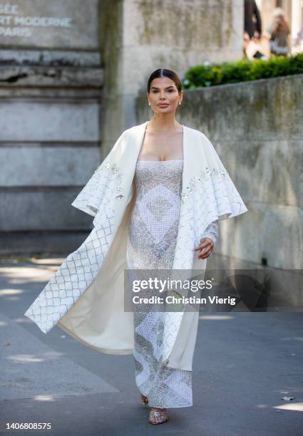 Victoria Barbara seen wearing creme white cape, off shoulder dress outside Georges Hobeika during Paris Fashion Week - Haute Couture Fall Winter 2022...