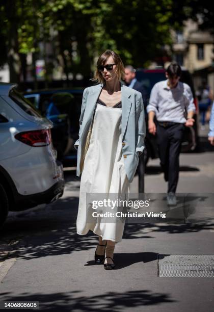 Anya Ziourova seen outside Dior during Paris Fashion Week - Haute Couture Fall Winter 2022 2023 : Day One on July 04, 2022 in Paris, France.