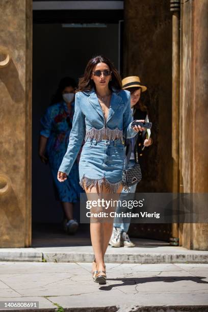 Gabrielle Caunesil is seen wearing denim skirt, jacket, Dior bag outside Georges Hobeika during Paris Fashion Week - Haute Couture Fall Winter 2022...