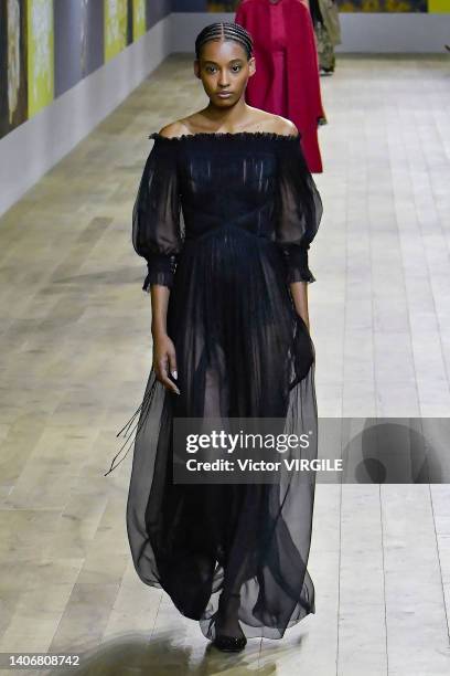 Model walks the runway during the Dior Haute Couture Fall/Winter 2022-2023 fashion show as part of the Paris Haute Couture Week on July 4, 2022 in...