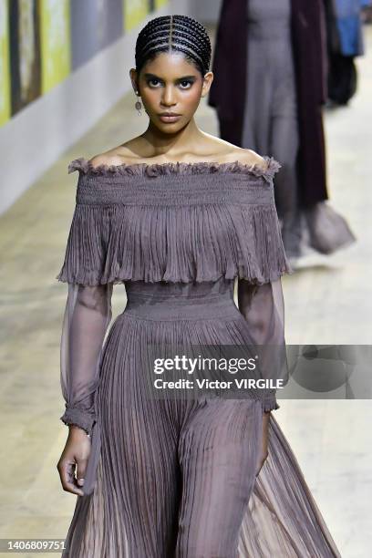 Model walks the runway during the Dior Haute Couture Fall/Winter 2022-2023 fashion show as part of the Paris Haute Couture Week on July 4, 2022 in...