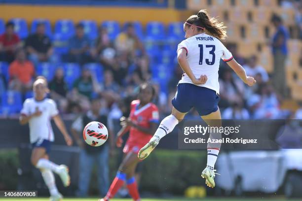 Alex Morgan of United States scores her team's first goal during the match between United States and Haiti as part of the 2022 Concacaf W...