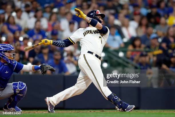 Victor Caratini of the Milwaukee Brewers hits a walk-off, three-run home run in the 10th inning against the Chicago Cubs at American Family Field on...