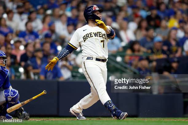Victor Caratini of the Milwaukee Brewers hits a walk-off, three-run home run in the 10th inning against the Chicago Cubs at American Family Field on...