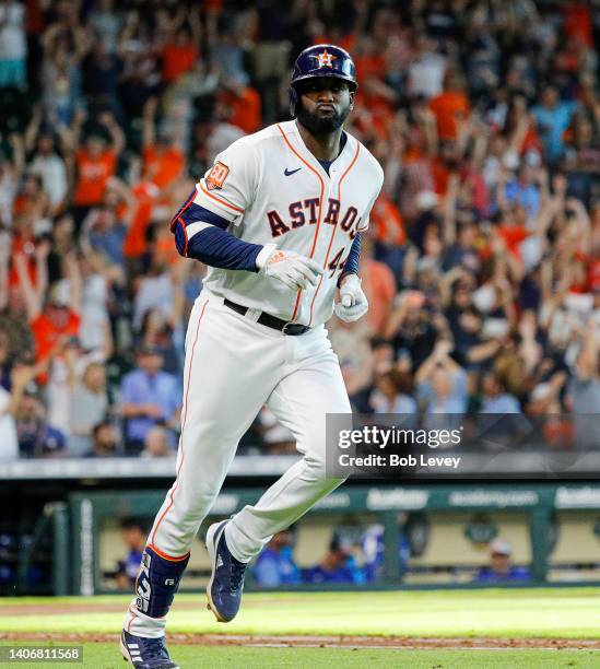 Yordan Alvarez of the Houston Astros is congratulated after hitting a walk-off home run in the ninth inning against the Kansas City Royals at Minute...