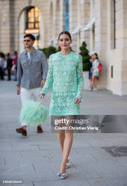 Olivia Palermo wearing green mint dress, bag, silver shoes seen outside during Paris Fashion Week - Haute Couture Fall Winter 2022 2023 : Day One on...