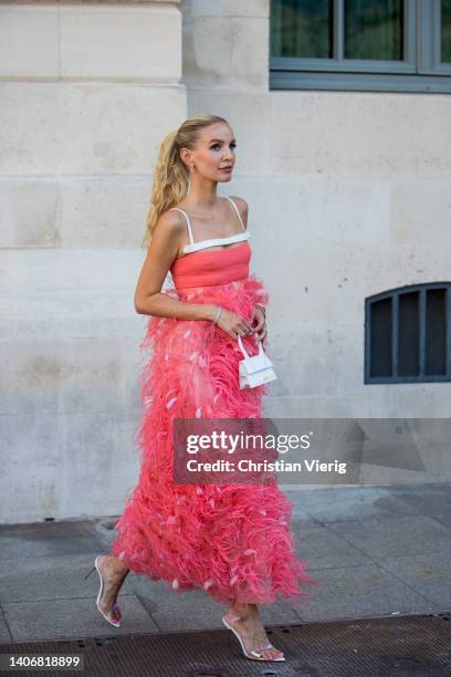 Leonie Hanne seen wearing red white dress, Jacquemus bag, heels outside Giambattista Valli during Paris Fashion Week - Haute Couture Fall Winter 2022...