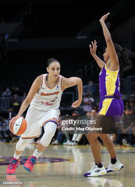 Diana Taurasi of the Phoenix Mercury drives against Lexie Brown of the Los Angeles Sparks in the second half at Crypto.com Arena on July 04, 2022 in...