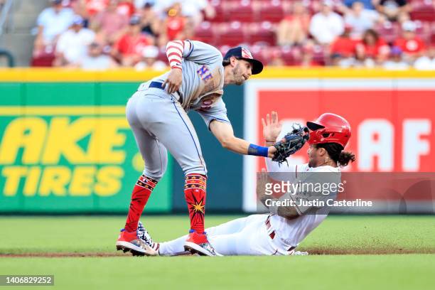 Jeff McNeil of the New York Mets tags out Jonathan India of the Cincinnati Reds attempting to steal second base in the fifth inning at Great American...