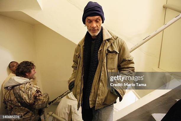 Jerome Chiles, who is currently unemployed, waits on line for a free meal at Lima Rescue Mission on March 4, 2012 in Lima, Ohio. A census report...