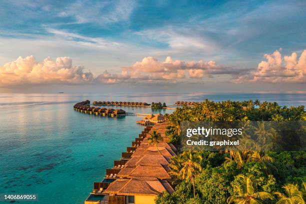 aerial view of luxury resort in maldives - hotel beach stock pictures, royalty-free photos & images