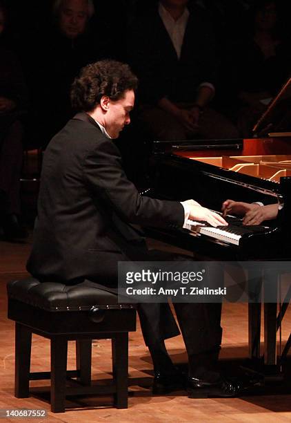Russian pianist Evgeny Kissin performs a solo piano recital with works by composers Chopin and Samuel Barber in addition to Beethoven's 'Moonlight...