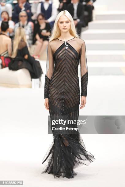 Model walks the runway during the Chanel Haute Couture Fall Winter 2022 2023 show as part of Paris Fashion Week on July 5, 2022 in Paris, France.