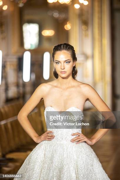 Model walks the runway during the Tony Ward Haute Couture Fall Winter 2022 2023 show as part of Paris Fashion Week At Shangri La on July 4, 2022 in...