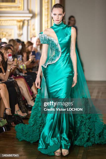 Model walks the runway during the Tony Ward Haute Couture Fall Winter 2022 2023 show as part of Paris Fashion Week At Shangri La on July 4, 2022 in...