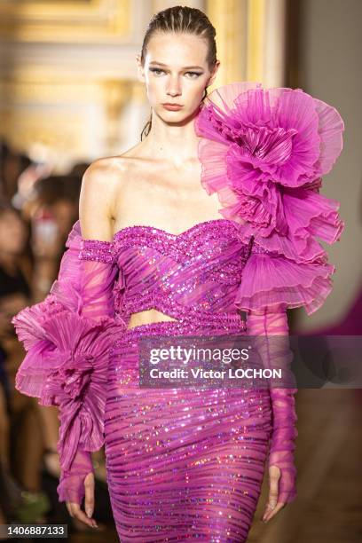 Model walks the runway during the Tony Ward Haute Couture Fall Winter 2022 2023 show as part of Paris Fashion Week At Shangri La on July 4, 2022 in...